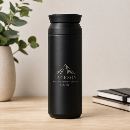 Personalised 500ml black insulated travel tumbler with custom laser engraved name or logo, stainless steel thermal flask and reusable travel mug.

